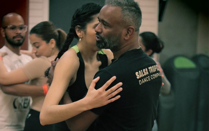Instructor supporting a participant during a session